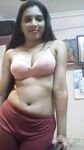 Desi Indian horny bhabhi exposes big boobs and rubs pussy