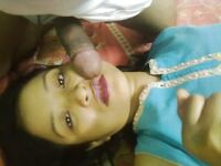 Porn pics of a beautiful girl giving an amazing blowjob to her lover