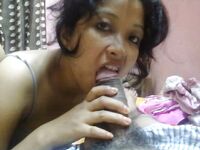 Free sexy pics of a shy bhabhi giving a blowjob to her horny husband