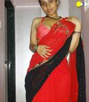 Sexy Auntie in red saree will make you horny