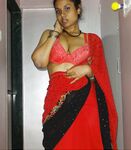 Sexy Auntie in red saree will make you horny