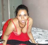 Sexy Auntie in red saree will make you horny