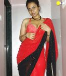 Sexy Auntie in red saree will make you horny