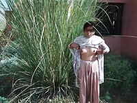 Porn images of slutty bhabhi getting naughty outdoor with her lover