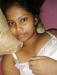Desi girl nude photos of Desi teen exposing her topless body