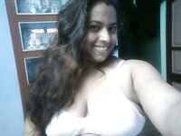 Busty Bengali MILF boobs show with a smiling face
