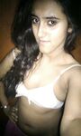 Indian skinny slut showing her small tits photos