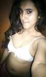 Indian skinny slut showing her small tits photos