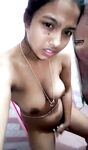 Voluptuous nude Indian girl fingering pussy photos