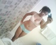 Busty Babe Karina Posing Hot On Camera