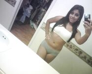 Busty Babe Karina Posing Hot On Camera