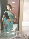Indian babe taking shower posing