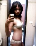 Indian babe taking shower posing