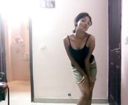 Indian babe taking shower posing