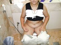 Mature indian wife in shower caught exposing hairy pussy