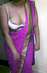 Indian homemaker stripping her traditional indian outfits