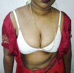 Mature indian housewife taking her indian outfits off in bedroom