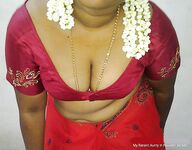 Mature indian housewife taking her indian outfits off in bedroom