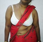 Mature indian housewife taking her indian outfits off in bedroom