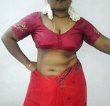 Mature indian housewife taking her indian outfits off in bedroom