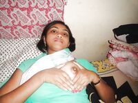 North Indian babe stripping naked flashing tits