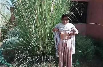 Porn images of slutty bhabhi getting naughty outdoor with her lover