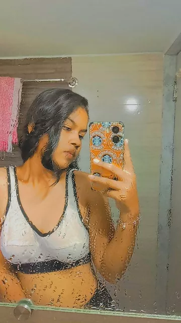 Indian college girl admiring her naked boobs