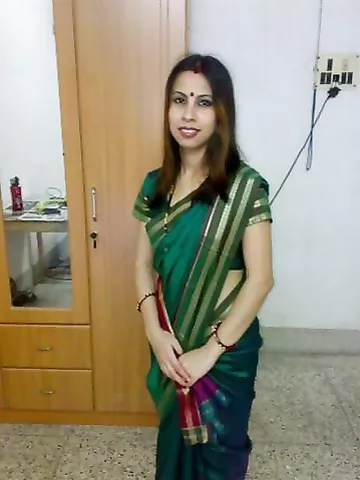 Sexy Indian Bhabhi Kusum Posing Hot On Camera