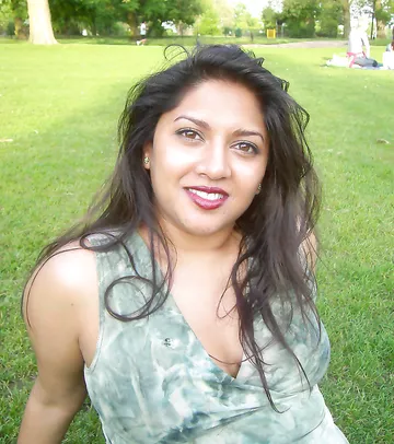 Busty indian babe laying naked in bed for her boyfriend