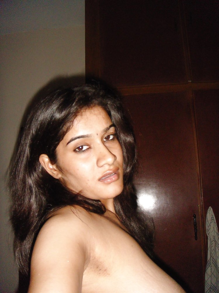 Selfie pictures of Desi girl licking own boobs