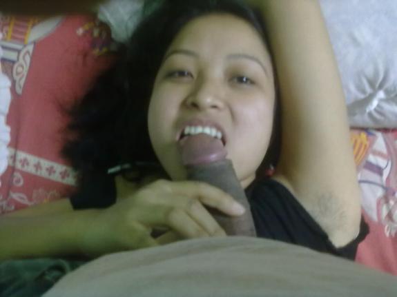 Indian sex pictures of horny bhabhi giving an amazing blowjob to lover