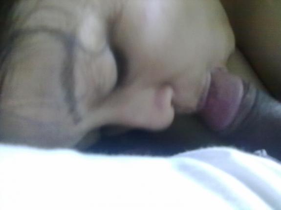 Indian sex pictures of horny bhabhi giving an amazing blowjob to lover