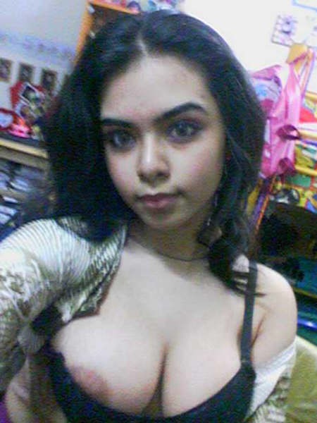 Beautiful college girl takes naughty selfies of her big boobs