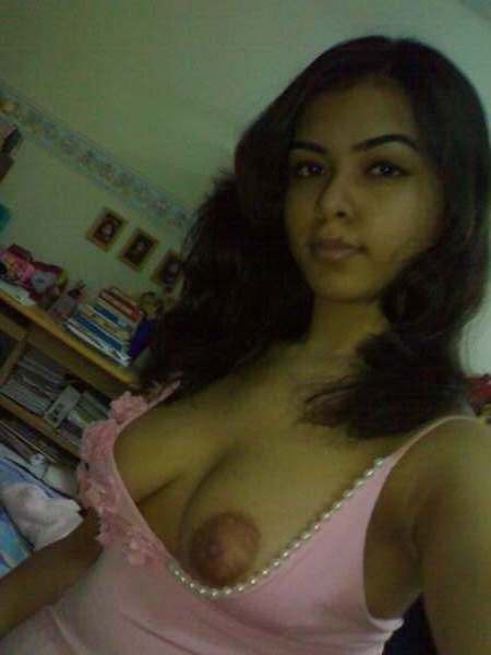 Beautiful college girl takes naughty selfies of her big boobs