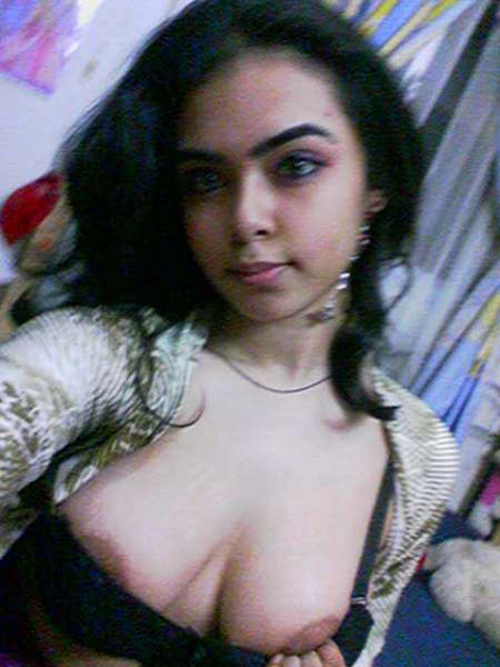 Beautiful college girl takes naughty selfies of her big boobs