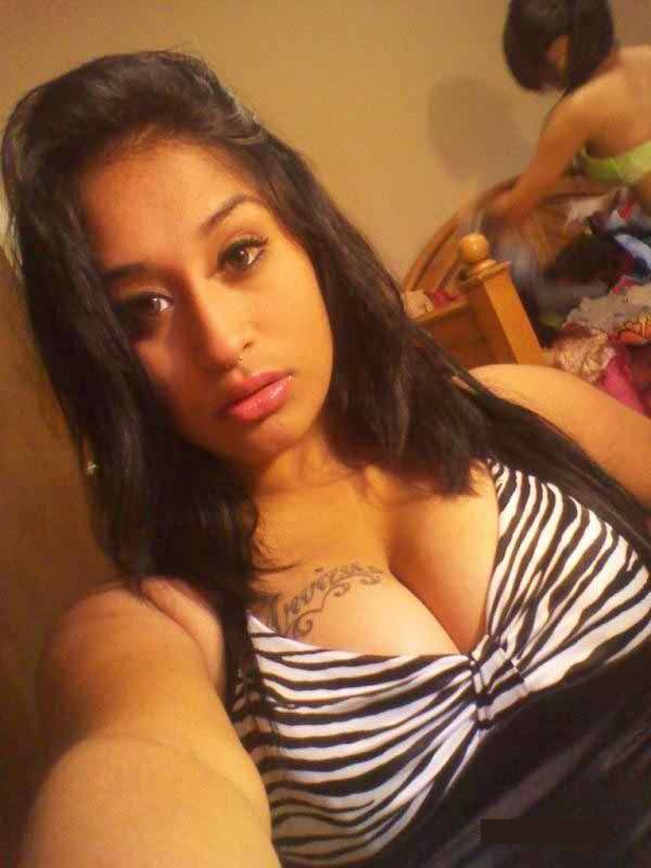 Beautiful college girl takes naughty selfies of her big boobs