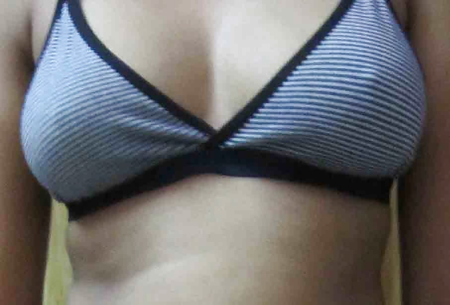 Lewd Indian wife does a striptease