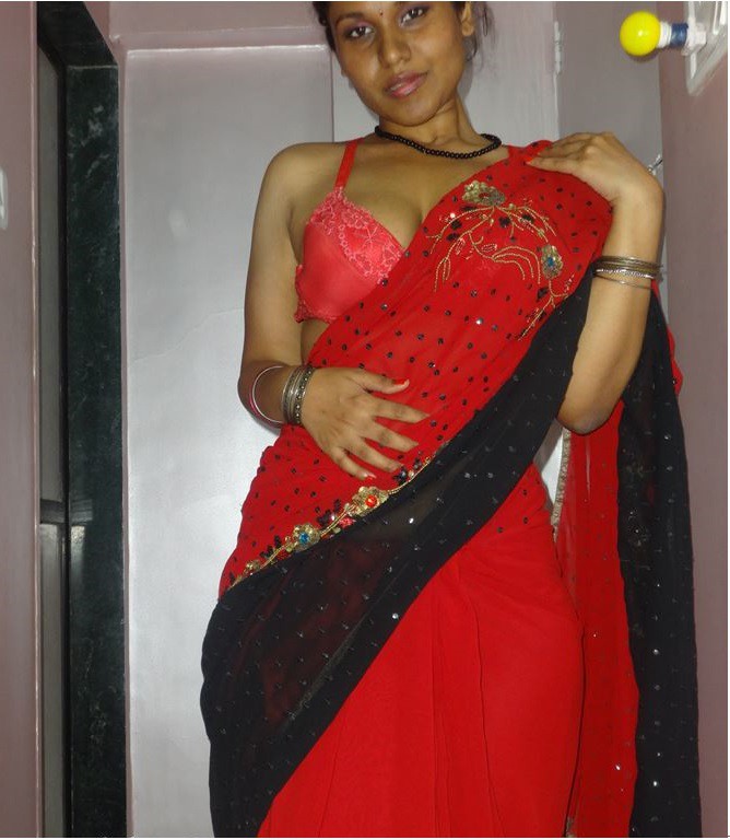 Sexy Auntie in red saree will make you horny