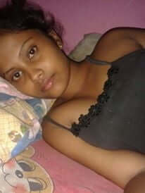 Desi girl nude photos of Desi teen exposing her topless body