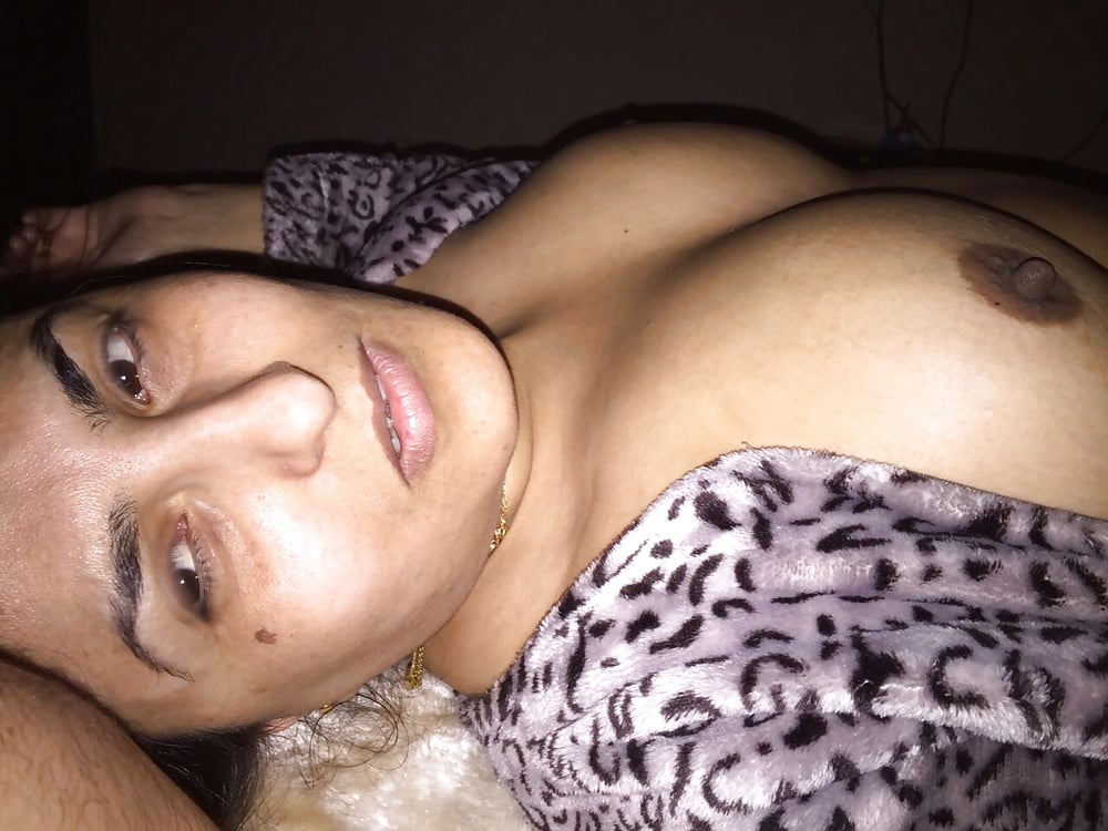 Indian Bhabhi changing Bra