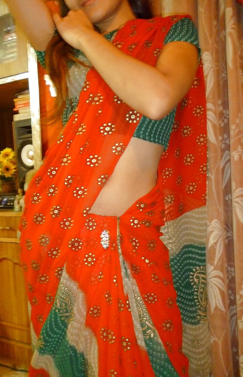 Slim Indian wife striptease pics