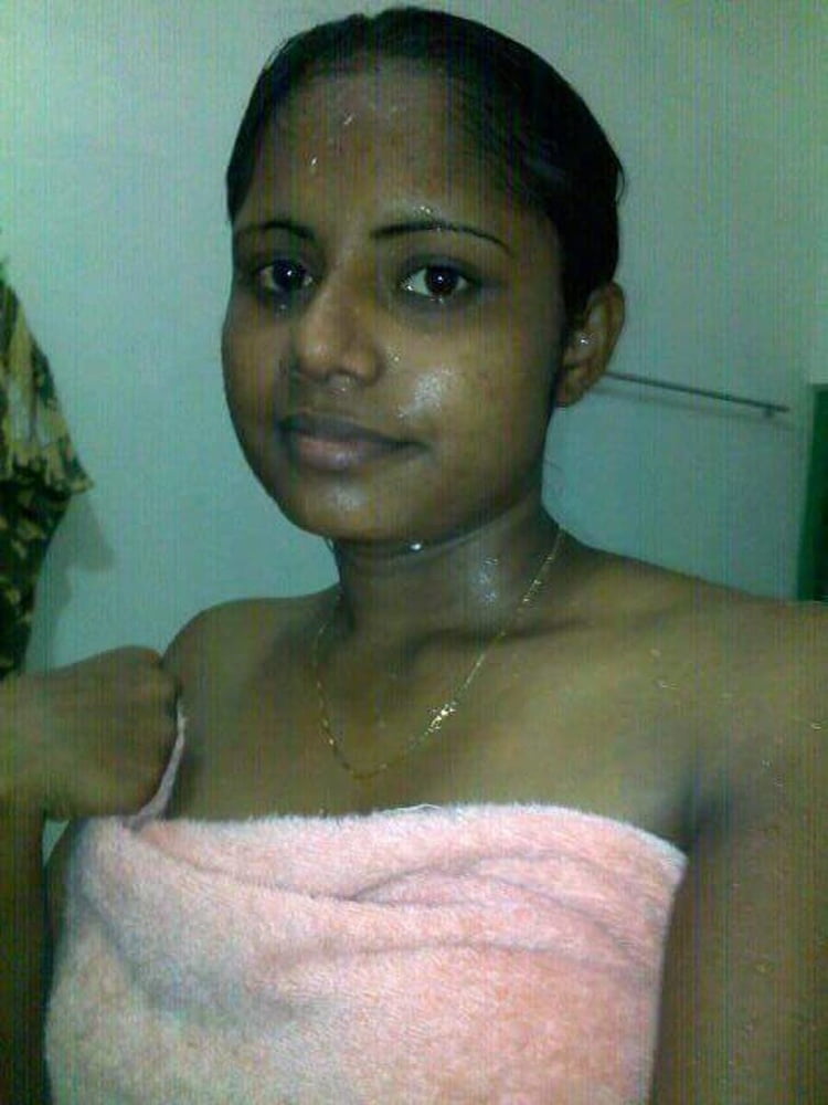 Dusky Indian girl showing her pink pussy hole