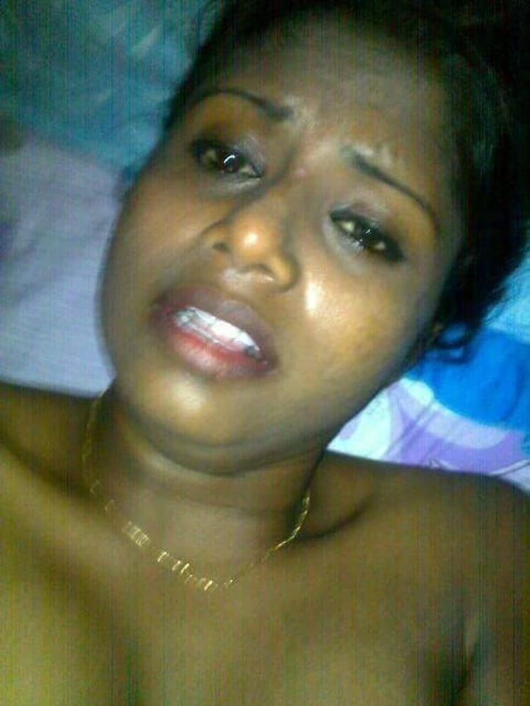 Dusky Indian girl showing her pink pussy hole