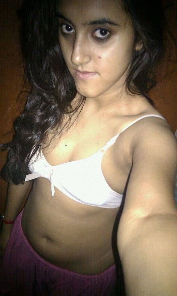 Indian skinny slut showing her small tits photos