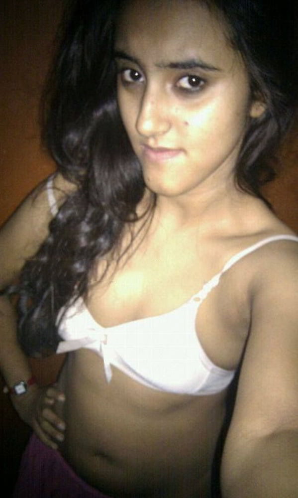 Indian skinny slut showing her small tits photos