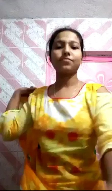 Voluptuous nude Indian girl fingering pussy photos