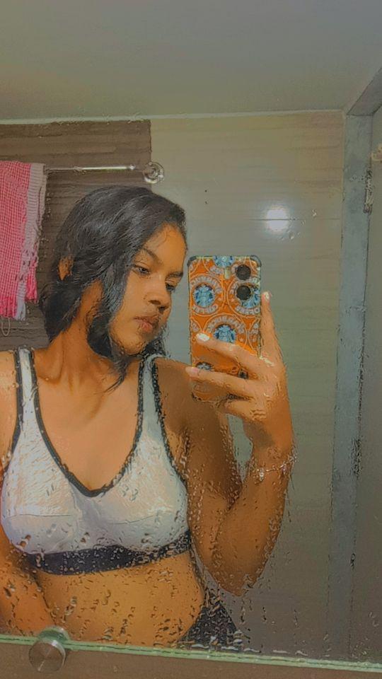 Indian college girl admiring her naked boobs