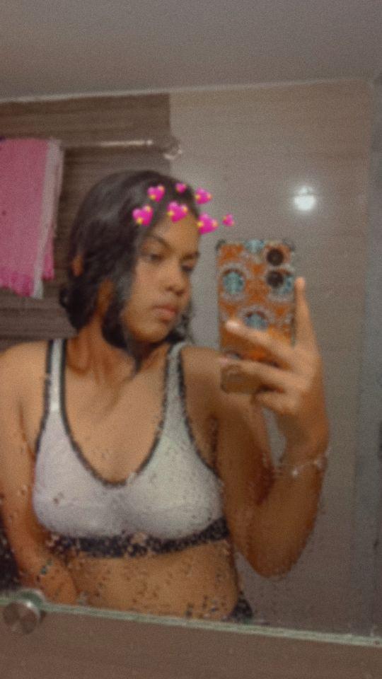 Indian college girl admiring her naked boobs