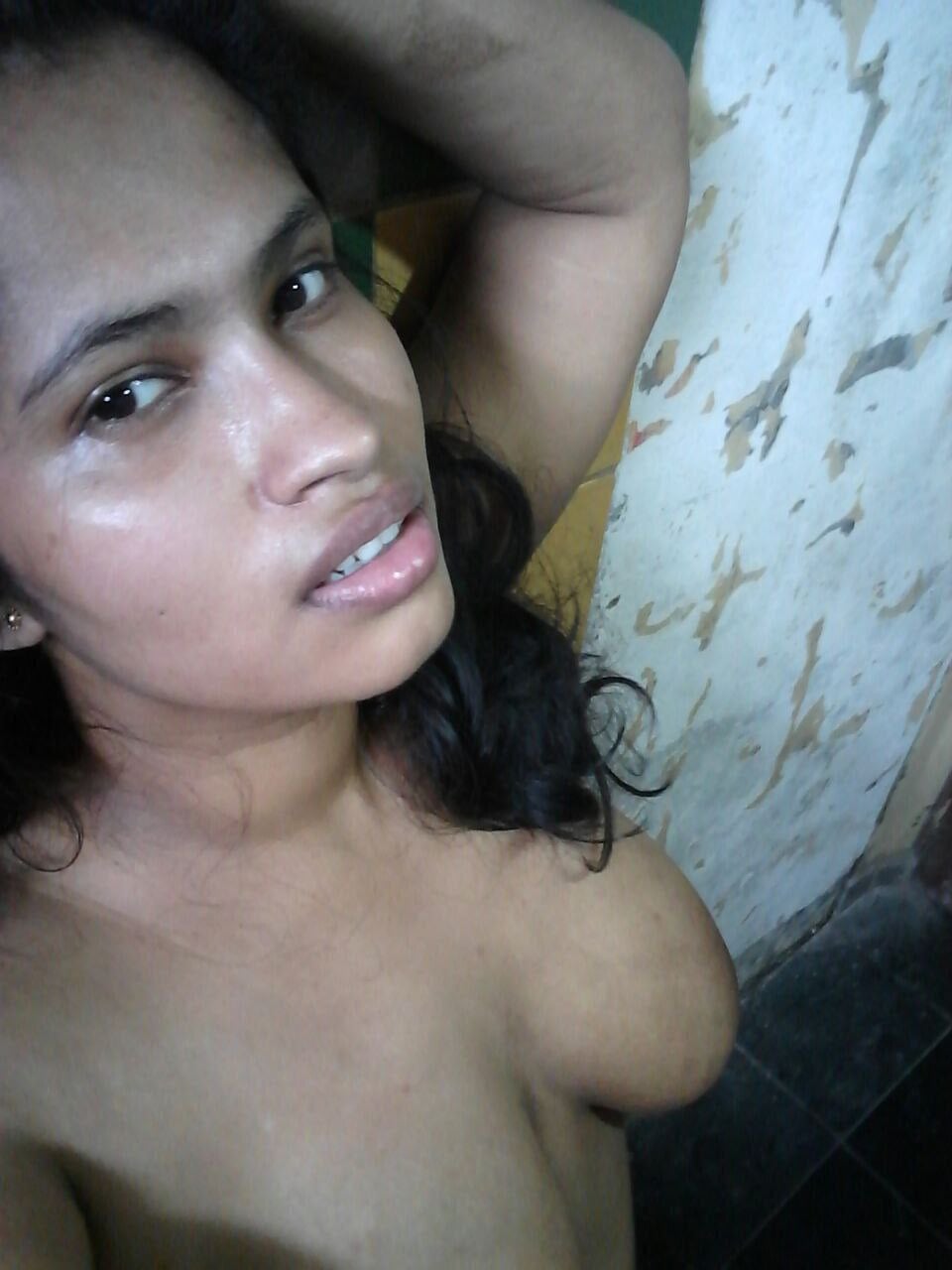 Busty Srilankan girl topless wet photo in bathroom