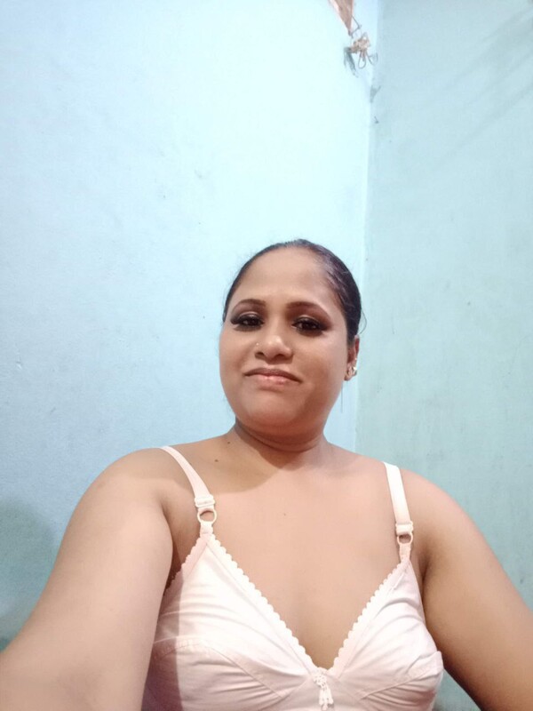 MILF standing topless in bathroom selfie show